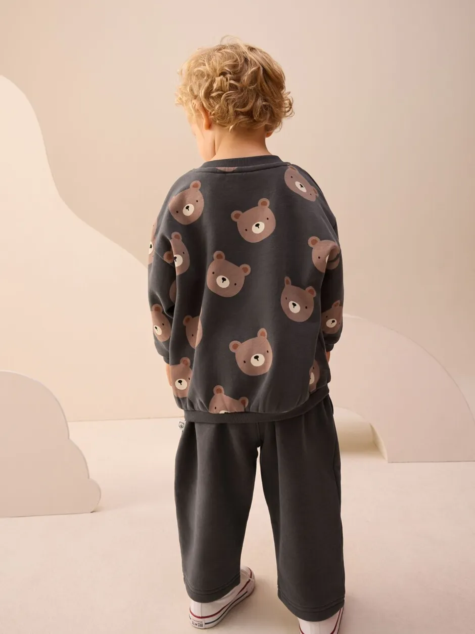 Truien En Breisels|Joggingbroeken|Next Antracietgrijze beer all-over print - Set met sweatshirt en joggingbroek met strepen (3mnd-7jr)