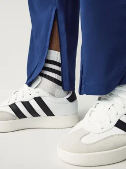 Joggingbroeken|adidas - Essentials 3-Strepen Stanford joggingbroek met open zoom Blauw