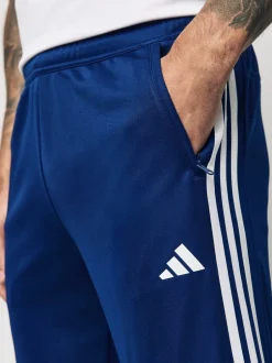 Joggingbroeken|adidas - Train Essentials trainingsjoggingbroek met 3 strepen Blauw
