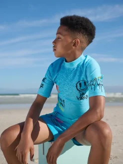 Badkleding*Next Blauw met graffitiprint - Surfhemdje (1,5 - 16 jr)
