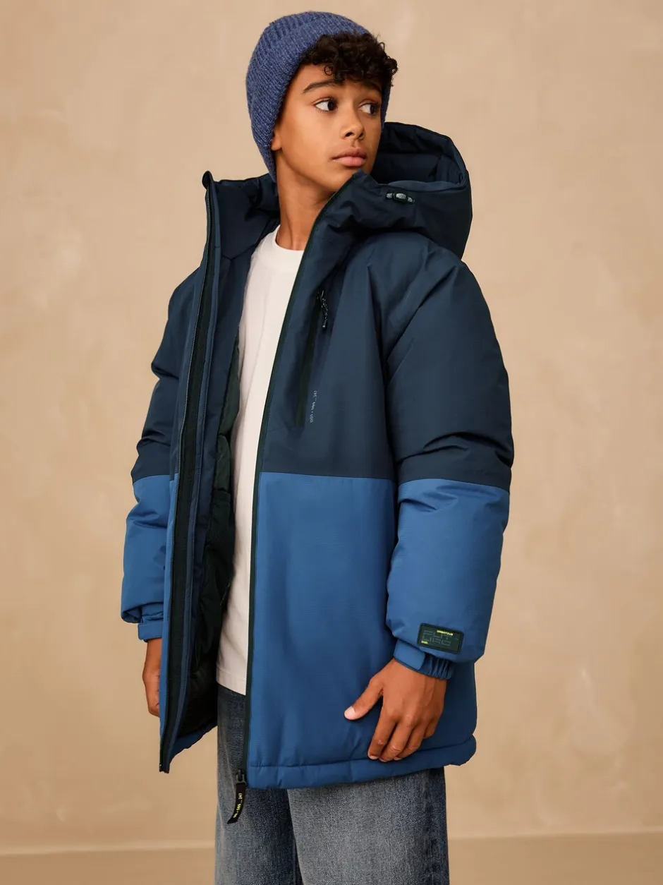 Schoolkleding|Jassen En Jacks*Next - Waterdichte gewatteerde binnenjas (3-16jr) Blauw met kleurvlakken