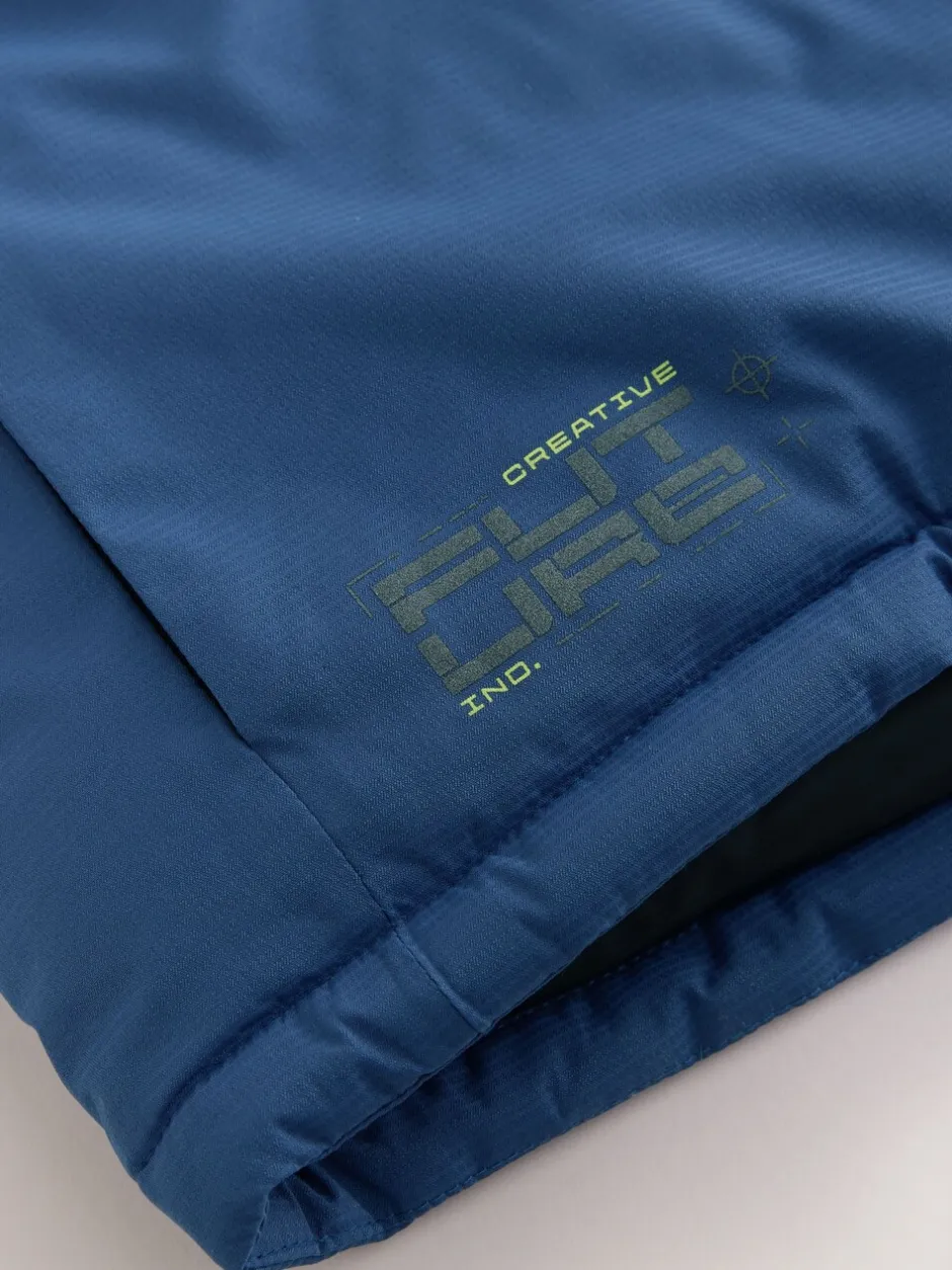 Schoolkleding|Jassen En Jacks*Next - Waterdichte gewatteerde binnenjas (3-16jr) Blauw met kleurvlakken