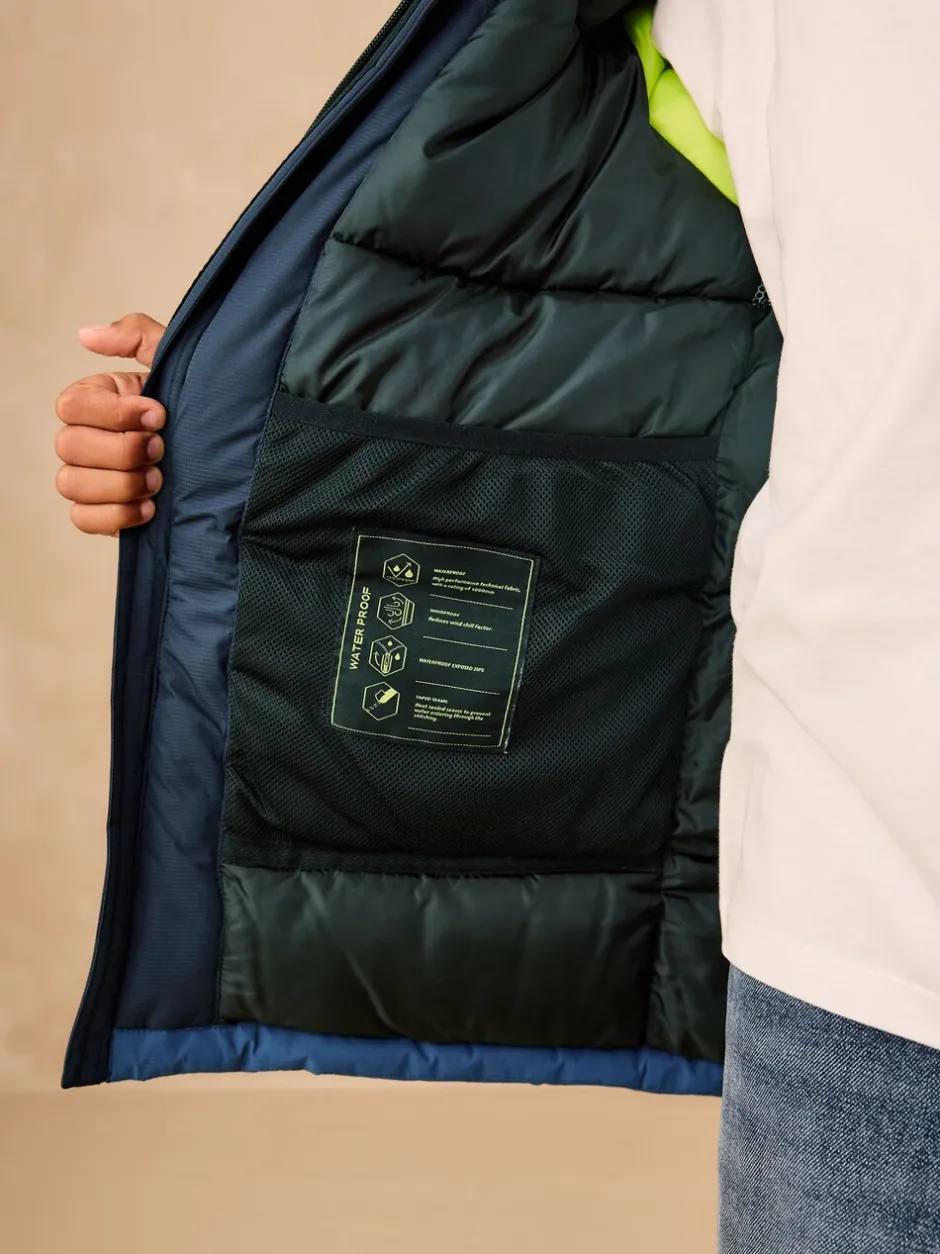 Schoolkleding|Jassen En Jacks*Next - Waterdichte gewatteerde binnenjas (3-16jr) Blauw met kleurvlakken