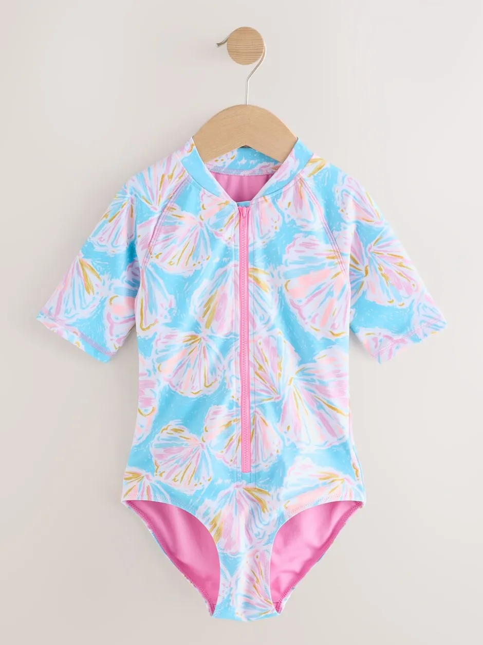 Badkleding*Next - Short Sleeved Sunsafe Swimsuit (3mths-16yrs) Blauw met schelp