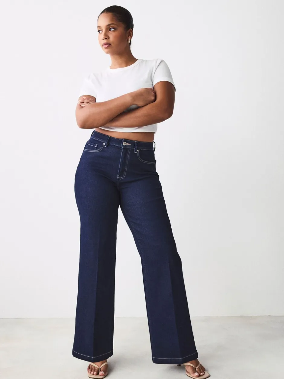 Jeans*Next - Jeans met zandloperpasvorm en wijde pijpen Blauw met wassing