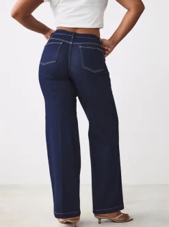 Jeans*Next - Jeans met zandloperpasvorm en wijde pijpen Blauw met wassing
