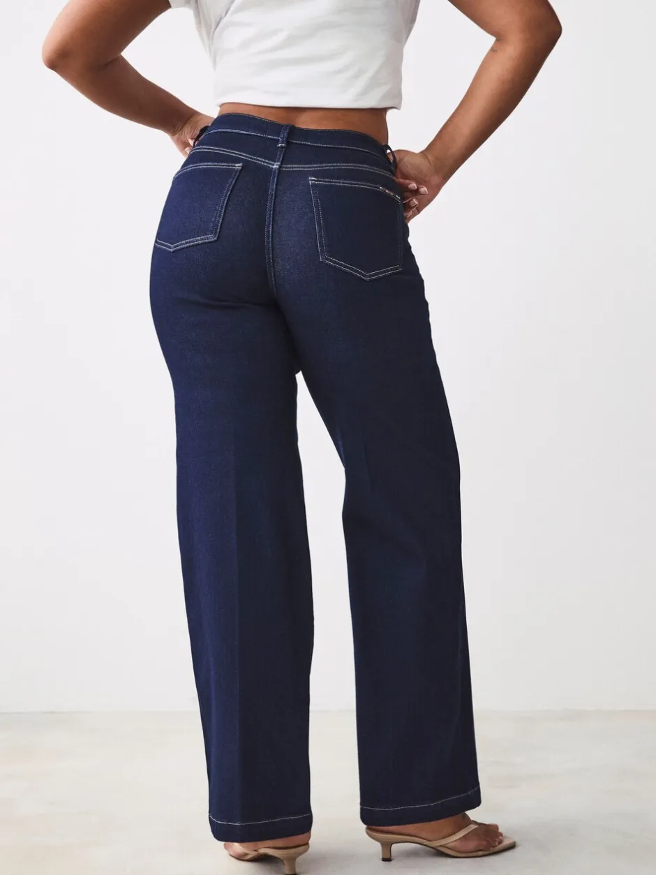 Jeans*Next - Jeans met zandloperpasvorm en wijde pijpen Blauw met wassing