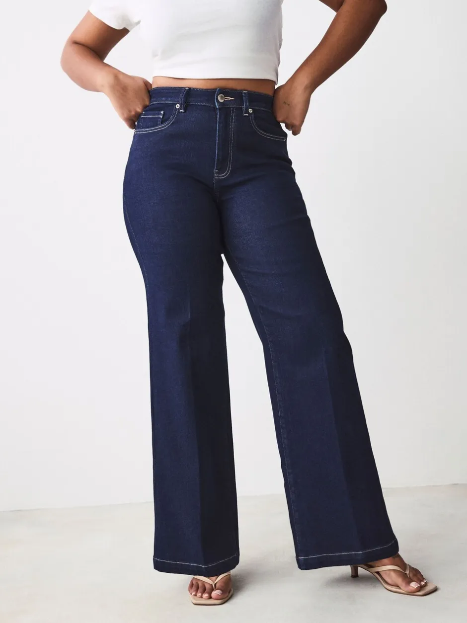 Jeans*Next - Jeans met zandloperpasvorm en wijde pijpen Blauw met wassing