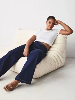 Jeans*Next - Jeans met zandloperpasvorm en wijde pijpen Blauw met wassing