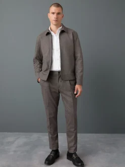 Formele Broek|Broeken En Chino's*Next - Slim fit getextureerde broek met elastische achterkant en stretchy Bruin