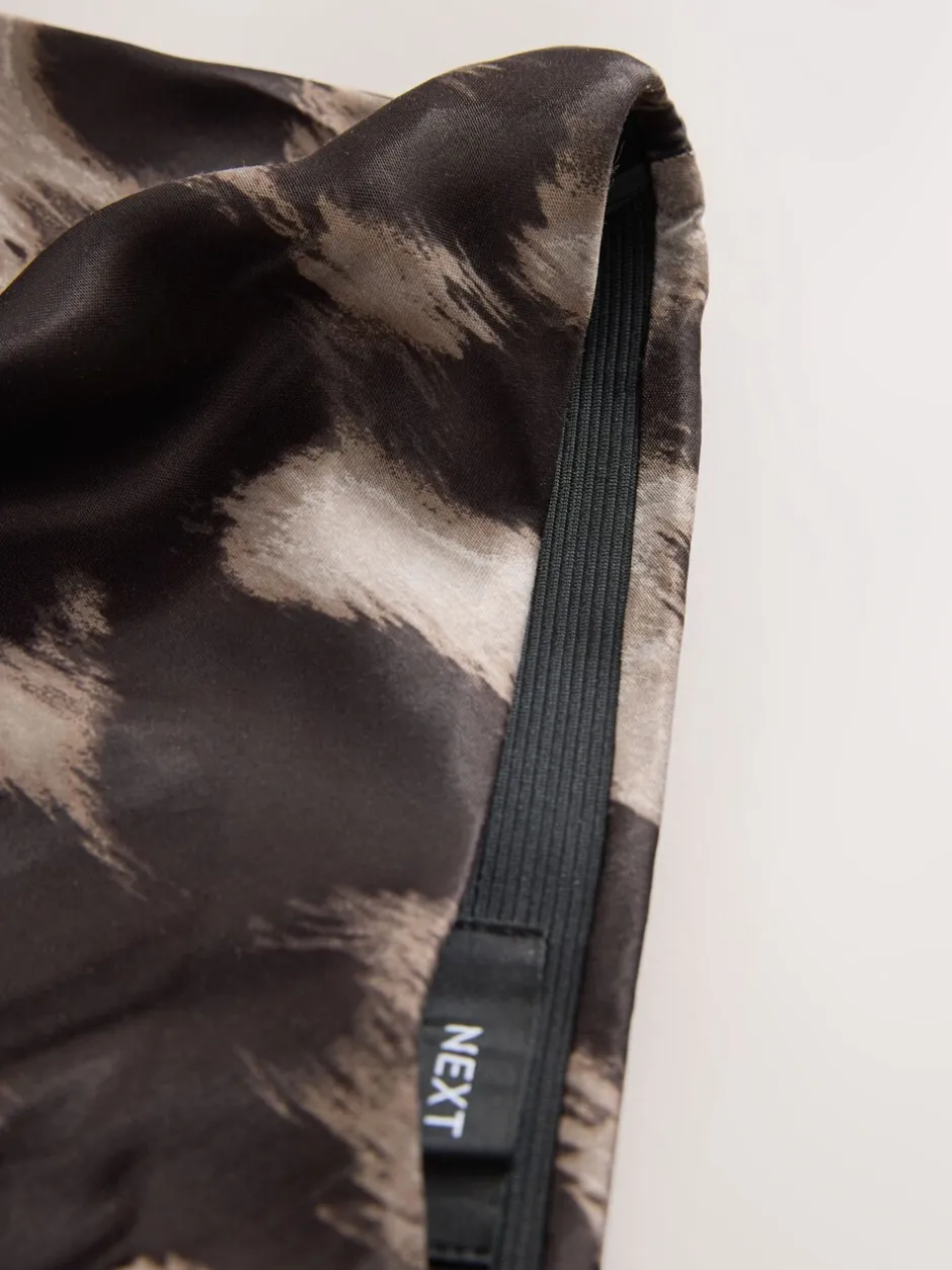 Rokken*Next - Satijnen midirok Bruin met dierenprint