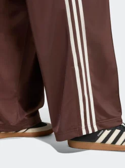 Sportkleding|Broeken*adidas originals Bruin/wit - Firebird ruimvallende Broek