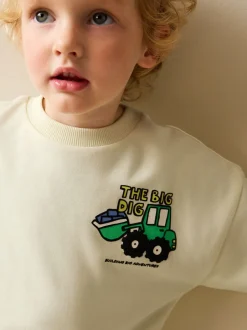 Truien En Breisels|Sweaters En Hoody´S*Next Buttermilk Yellow Digger - Jersey sweatshirt met ronde hals en print op de rug (3mnd -7jr)