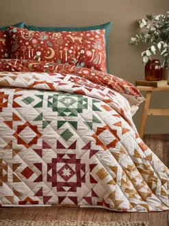 Catherine Lansfield|Catherine Lansfield - Doorgestikte beddensprei met geometrisch patchworkmotief in herfstkleuren