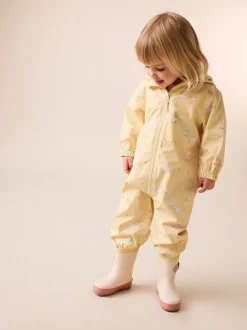 Jassen, Jacks En Kinderwagenpakjes|Jassen En Jacks|Next - Waterbestendig regenpak met print (6 mnd-7 jr) Citroengeel