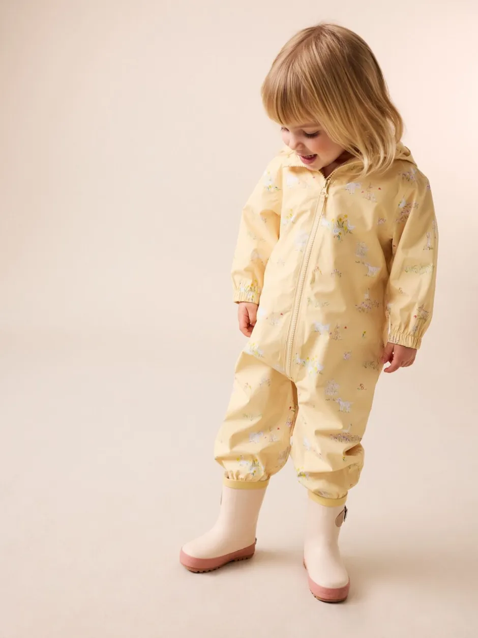 Jassen, Jacks En Kinderwagenpakjes|Jassen En Jacks|Next - Waterbestendig regenpak met print (6 mnd-7 jr) Citroengeel