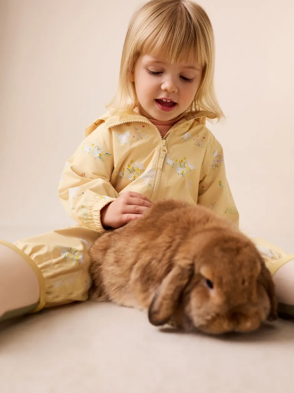 Jassen, Jacks En Kinderwagenpakjes|Jassen En Jacks|Next - Waterbestendig regenpak met print (6 mnd-7 jr) Citroengeel