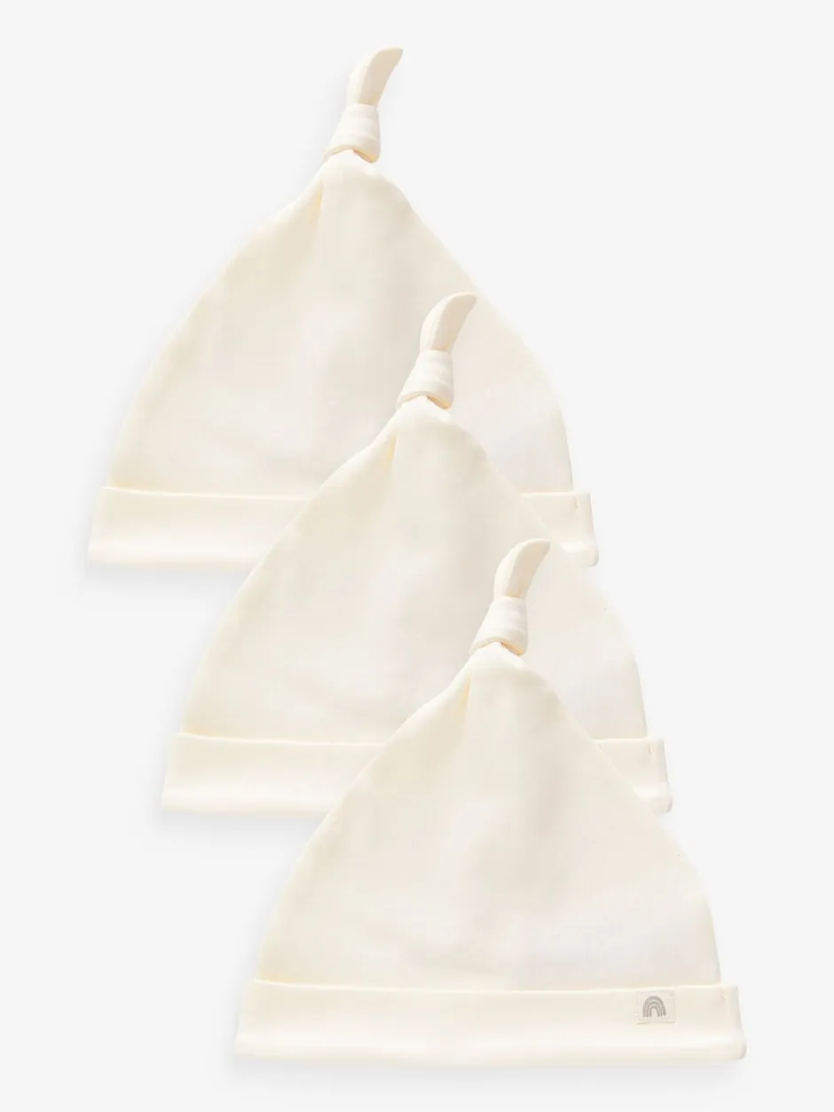 Mutsjes En Antikrabwantjes|Next - Verpakking van 3 babyhoeden van 100% katoen met gestrikte bovenkant (0 - 12 mnd) Crème