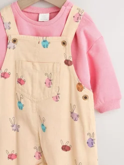 Rompertjes En Tuinbroeken|Tuinbroeken|Next - Babyset van tuinbroek en rompertje, tweedelig (0mnd-3jr) Crème/Roze konijn