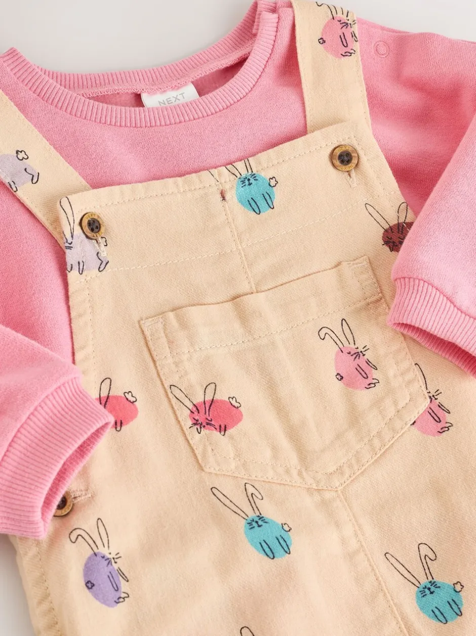 Rompertjes En Tuinbroeken|Tuinbroeken|Next - Babyset van tuinbroek en rompertje, tweedelig (0mnd-3jr) Crème/Roze konijn