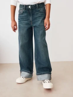 Jeans*Next Donkerblauw - Jeans met omgeslagen wijde pijpen (3-16jr)
