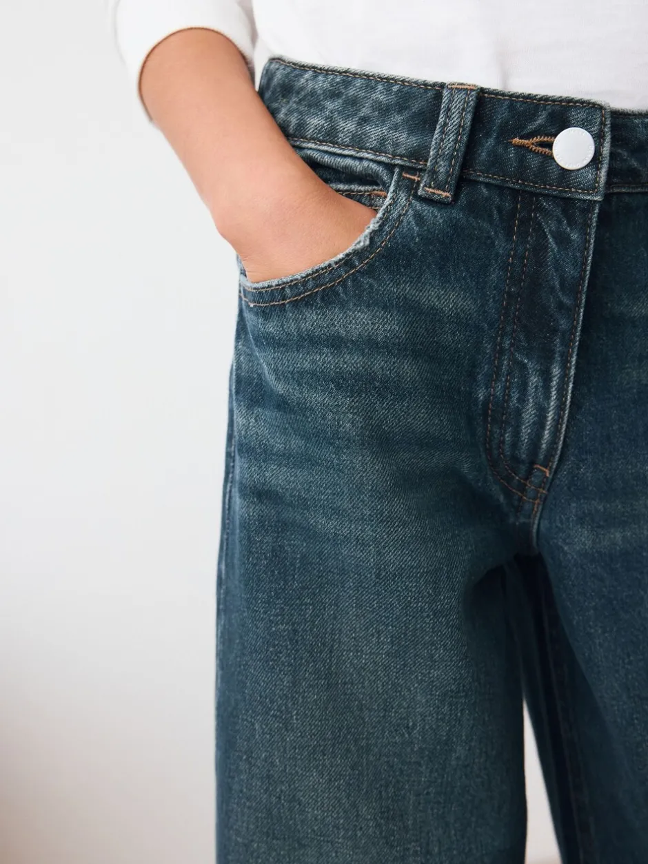 Jeans*Next Donkerblauw - Jeans met omgeslagen wijde pijpen (3-16jr)