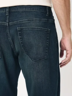 Jeans|Next Donkerblauwe wassing - Klassieke stretchjeans met standaard taps toelopende pasvorm