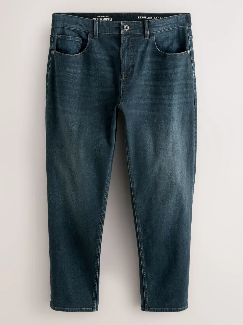 Jeans|Next Donkerblauwe wassing - Klassieke stretchjeans met standaard taps toelopende pasvorm