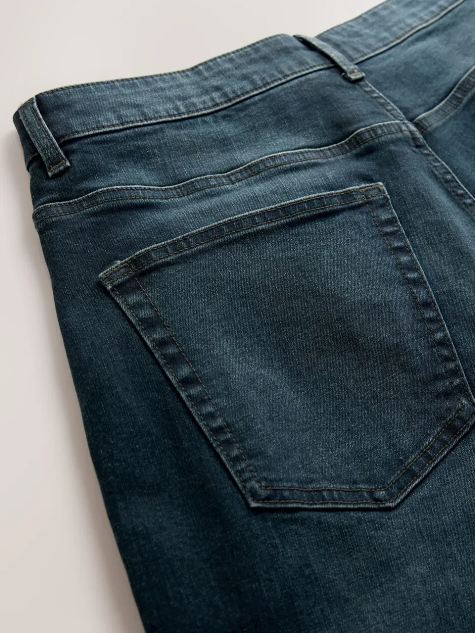 Jeans|Next Donkerblauwe wassing - Klassieke stretchjeans met standaard taps toelopende pasvorm