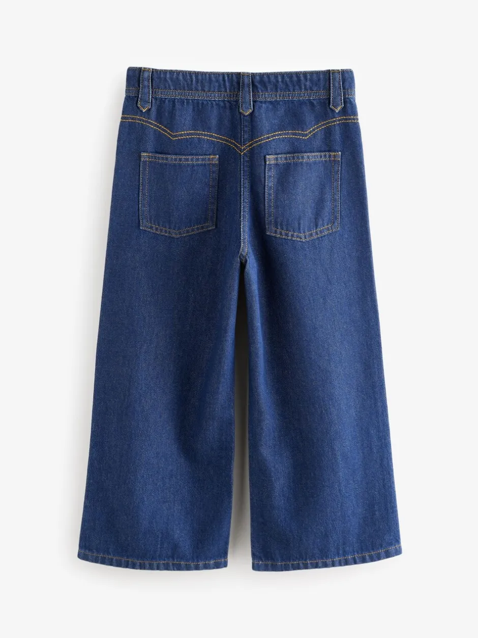 Jeans*Next Donkere inktblauwe wassing - Jeans met wijde pijpen (3-16 jr)
