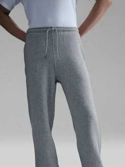 Joggingbroeken*Nike - Club Fleece joggingbroek met wijde pijpen Donkergrijs gemêleerd