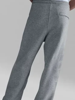 Joggingbroeken*Nike - Club Fleece joggingbroek met wijde pijpen Donkergrijs gemêleerd