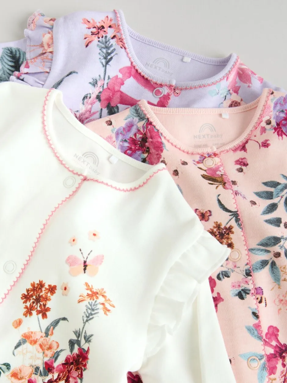 Babypakjes En Babypyjama's|Next Ecru met bloemenmotief - Verpakking van 3 babypyjama's (0 mnd-2 jr)