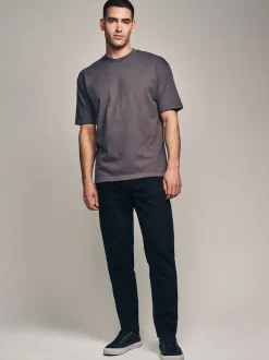 Jeans|Next Effen zwart - Klassieke stretchjeans met standaard taps toelopende pasvorm