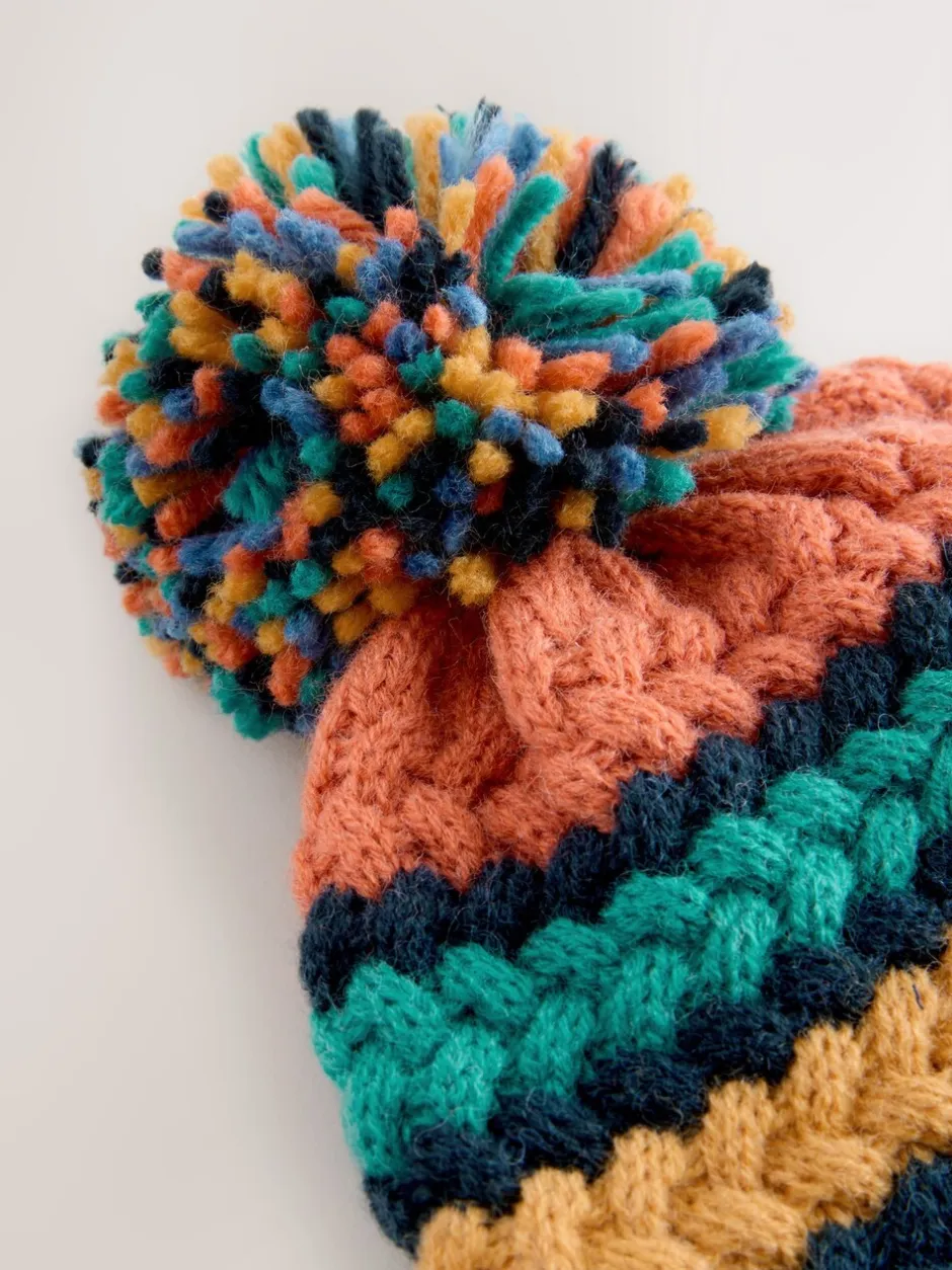 Mutsjes En Antikrabwantjes|Mutsen, Handschoenen En Sjaals|Next Fel kabelgebreid - Gebreide Baby muts met pompon (0mnd -2jr)