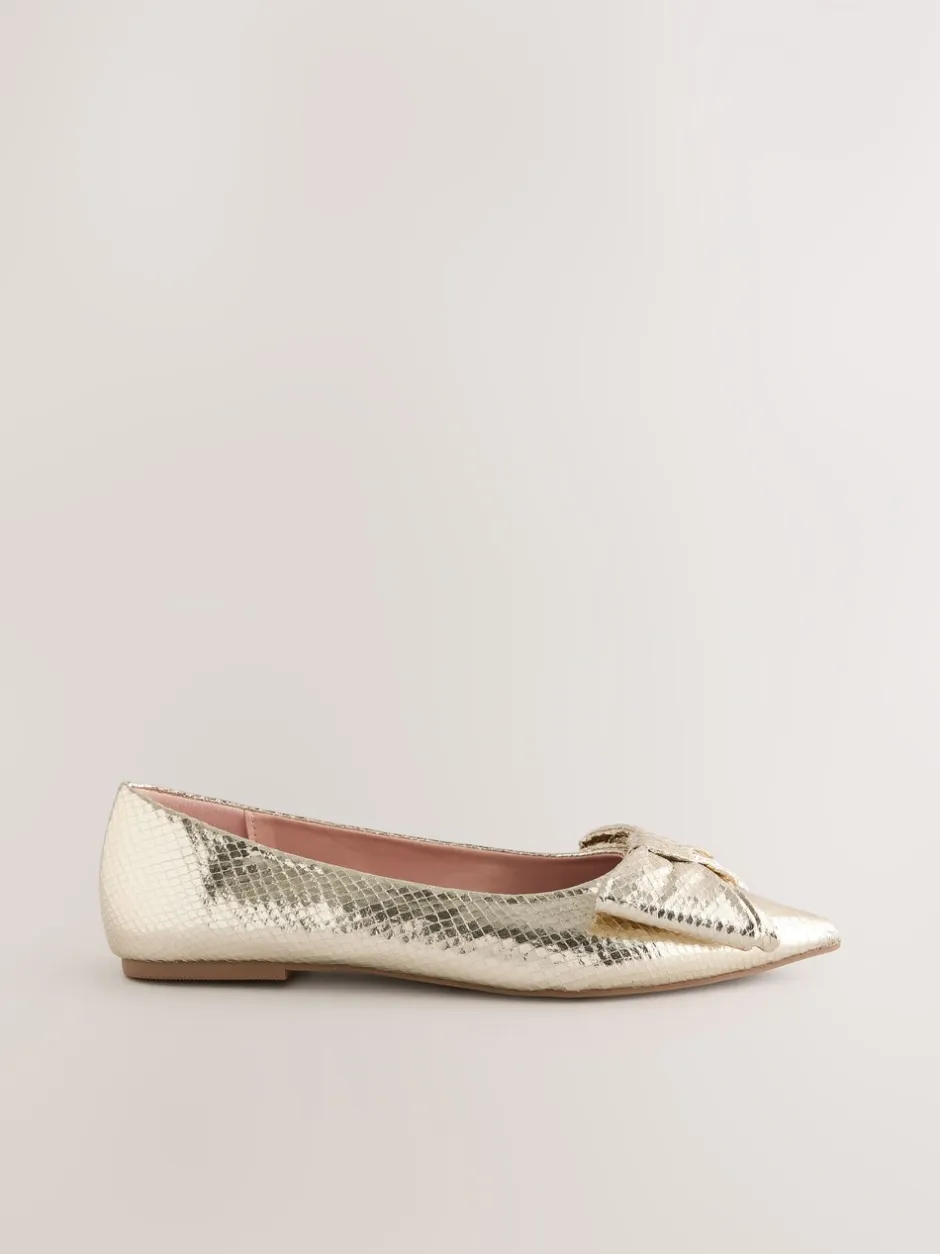 Lage Schoenen|Next - Ballerina's met spitse neus en strik Goud