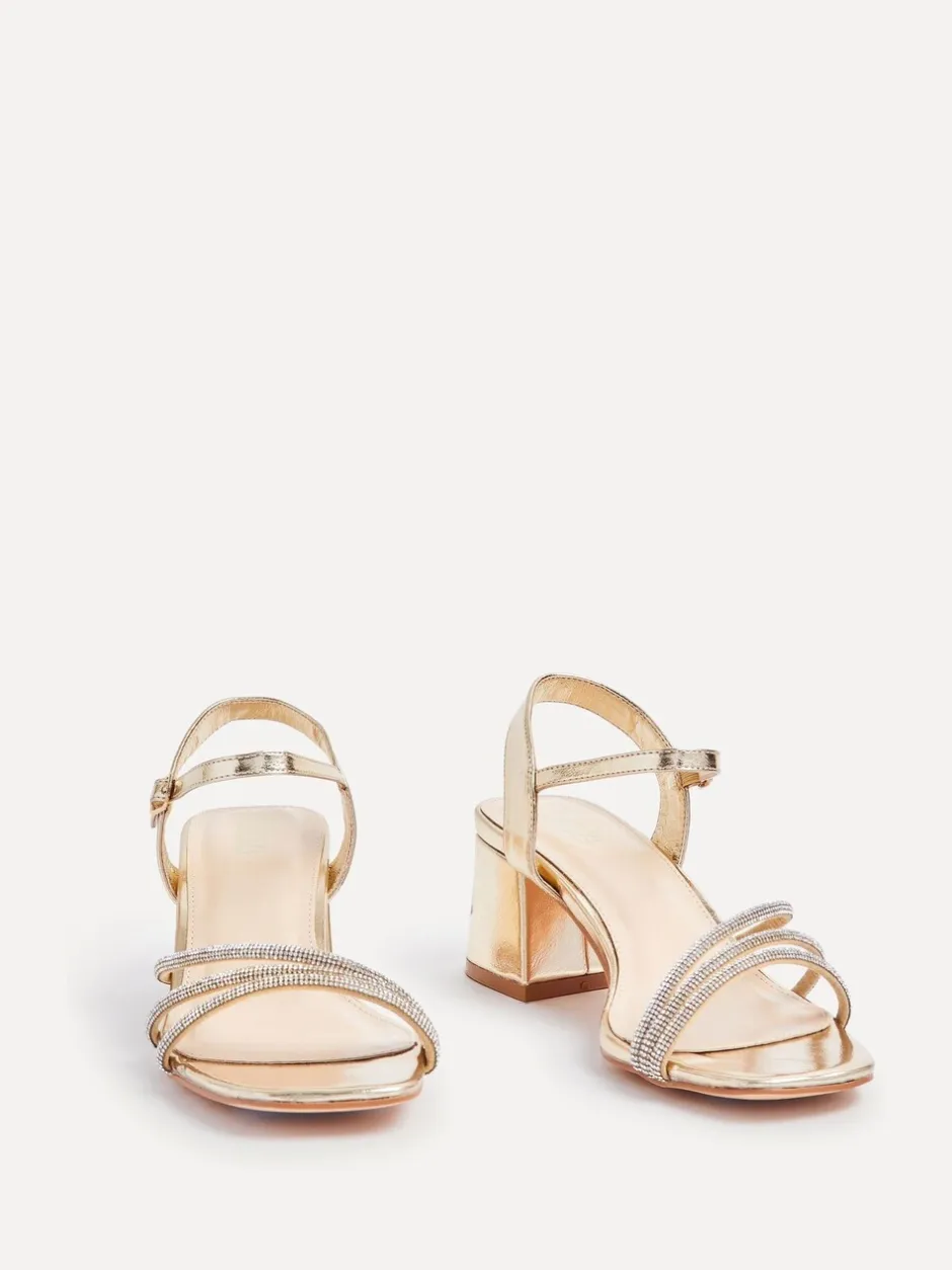 Ruimvallend En Extraruimvallend|Schoenen Met Hakken|Linzi - Mariah sandalen met hak, versiering en brede pasvorm Goud