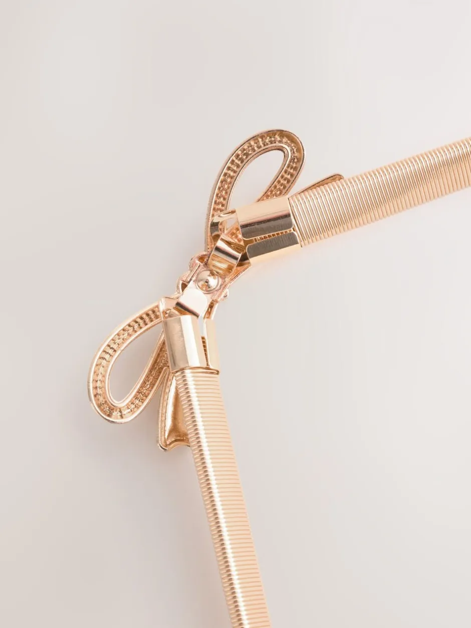 Ceintuurs|Next - Smalle stretchriem Gouden Strik