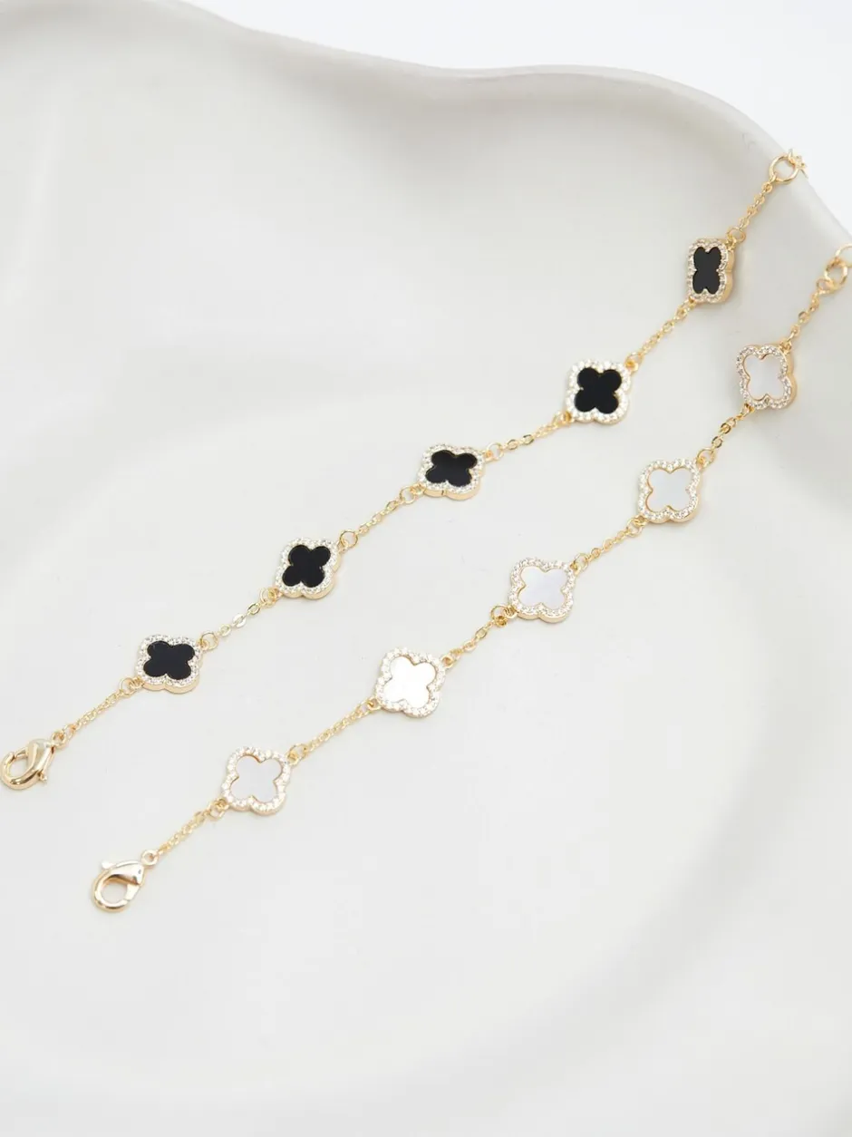 Sieraden|Jon Richard Goudkleurig - klaverarmband met zwarte emaille