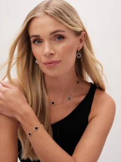 Sieraden|Jon Richard Goudkleurig - klaverarmband met zwarte emaille
