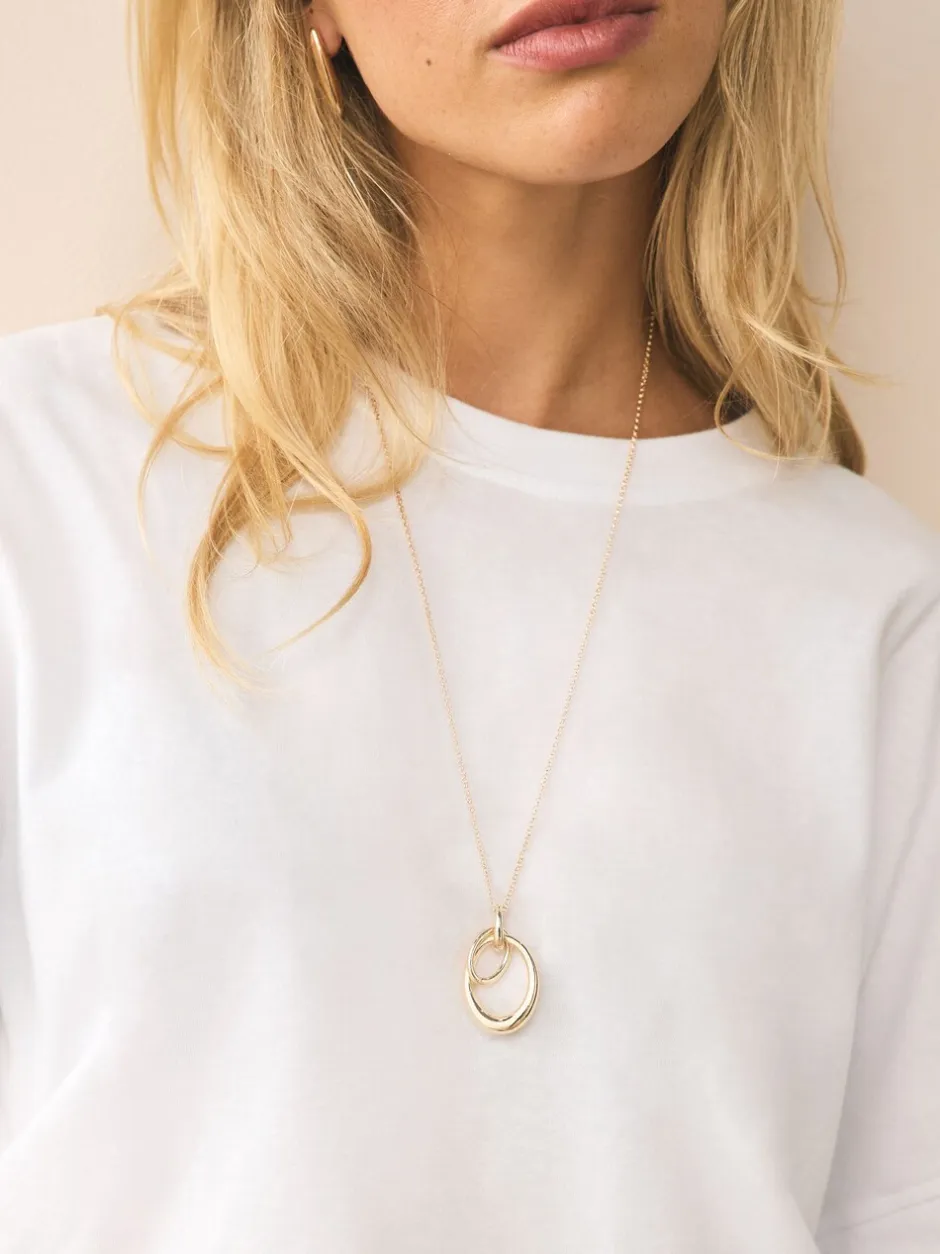 Sieraden|Next - Ketting met hangertje van vereende ringen Goudkleurig
