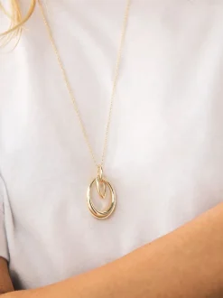 Sieraden|Next - Ketting met hangertje van vereende ringen Goudkleurig