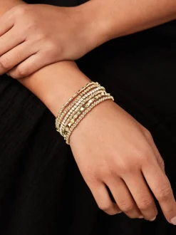 Sieraden|Gelegenheidskleding*Next - Set van glinsterende rekbare armbanden Goudkleurig