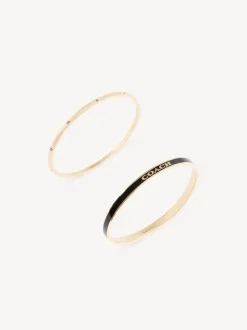 Sieraden|Coach - goudkleurige Signature Duo Bangle set in doosje Goudkleurig/zwart