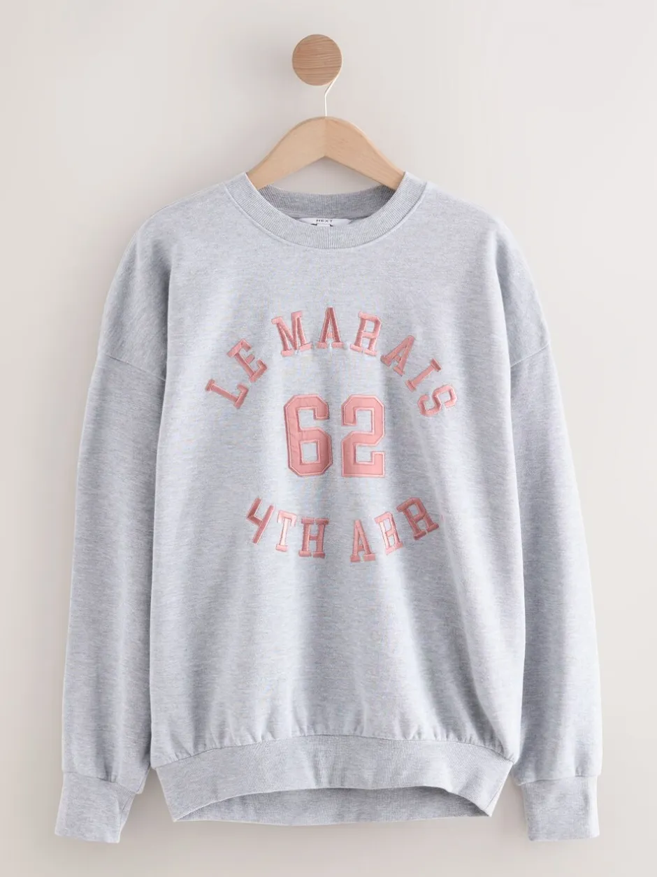 Hoody's En Sweatshirts*Next Grijs - Grafisch satijnapplicatie 'Le Marais' City sweatshirt met lange mouwen en ronde hals