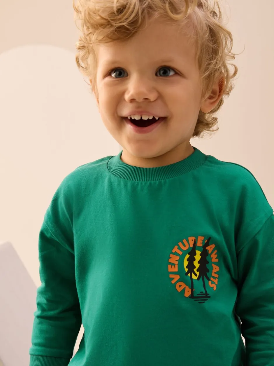 T-Shirts|Tops|Next Groene scène - T-shirt met lange mouwen en print op de rug (3mnd -8jr)