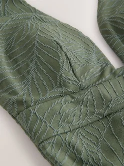 Badkleding*Next Kakigroen met bladertextuur - Diepuitgesneden vormgevend buikcorrigerend badpak