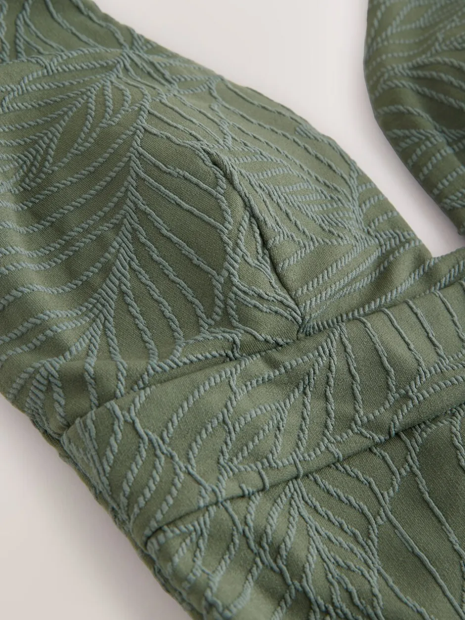 Badkleding*Next Kakigroen met bladertextuur - Diepuitgesneden vormgevend buikcorrigerend badpak