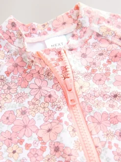 Badkleding*Next Koraalroze met fijne bloemenprint - Zonbeschermend badpak met lange pijpen (3 mnd-7 jr)