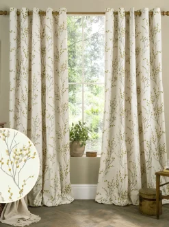 Laura Ashley*Laura Ashley ringgordijnen met voering en wilgenkatjesprint Okergeel